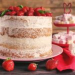 Carrot Cake Decorations Colorful sprinkles, carrot-shaped candies, and cream cheese frosting adorn this delectable carrot cake