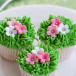 Sheet Cake Decorated Colorful sheet cake decorated with edible flowers and frosting design for birthdays and celebrations