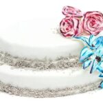 Christmas Cake Decoration Christmas cake with festive decorations including snowflake icing and miniature Santa Claus on top