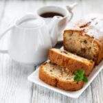 Bundt cake decorated with beautiful icing and toppings, showcasing expert bundt cake decorating skills