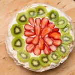 Step-by-step guide on how to decorate a cake with precision and creativity