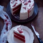 Elegant silver cake stand with beautifully decorated tiers for showcasing your cake