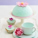 Decoration Ideas for Carrot Cake Delicious carrot cake with cream cheese frosting, garnished with elegant edible floral decorations