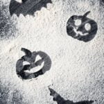 Step-by-step guide for how to decorate a frozen cake with edible snowflakes and icy blue frosting