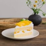 How to Decorate a Square Cake With Strawberries Square cake being decorated with fresh strawberries, step-by-step guide