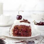 How to Decorate Coconut Cake How to decorate coconut cake: frosting with coconut flakes and a drizzle of caramel sauce