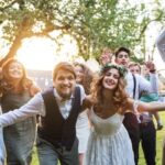 A Picture of a Wedding Cake Delicious three-tiered wedding cake with floral icing and topper figurines