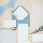 How to Decorate a Wedding Arch with Fabric: Draping white chiffon for an elegant touch