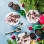Christmas-themed cake pops with red and green sprinkles, perfect for holiday dessert tables
