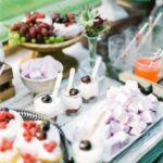 Decorate cake pops with colorful icing to create fun and delicious treats