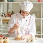 Step-by-step guide on how to decorate a chocolate cake with buttercream frosting for a delightful dessert