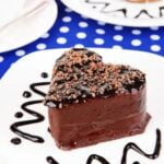 How to Decorate a Valentine Heart Cake How to decorate a Valentine heart cake with pink and red frosting and heart-shaped sprinkles