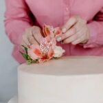 How to Decorate a Christmas Fruit Cake How to Decorate a Christmas Fruit Cake: Festive icing, holly, and candy canes