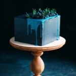 Step-by-step guide on how to decorate a Valentine cake with heart-shaped designs and vibrant colors