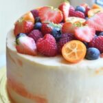 How to Decorate Thanksgiving Cake Step-by-step guide on how to decorate Thanksgiving cake with autumn leaves and pumpkin design