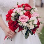 What Do Ushers Do at a Wedding In this image, ushers assist guests to their seats at a wedding ceremony