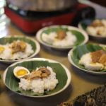 Elegant formal attire with a touch of sparkle and sophisticated accessories