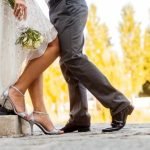 What Finger Does Wedding Ring Go On Woman's left ring finger wearing wedding ring, symbolizing love and commitment