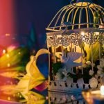 White lace A-line boho wedding dress with flower embroidery and open-back detail