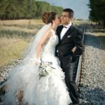 Slide engagement ring first, then wedding band, on left hand ring finger