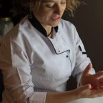 Learn step-by-step how to decorate a fish shaped cake with vibrant colors and edible decorations