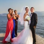 What to Wear for a Beach Wedding Male lightweight linen suit, sandals, and tropical accessories for a stylish look